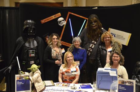 HASC staffers Megan Hodge (from left), Shauna Day, Kim Mannos, Wendy Gates and Julia Slininger got into the Classic Star Wars spirit at April 14's strolling dinner and exhibit.