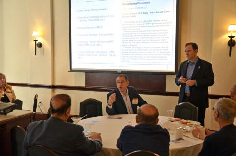 Cyber security consultants Arnie Schaffer (center) and Art Ehuan (right) delivered an authoritative message on the hacking threat at April 15's Cyber Security Breakfast.