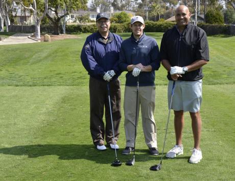 Golf event low-score holder Ryan Sader of Toyon Associates, Inc. (center) posed with HASC's Marty Gallegos (left) and Charles McLaurin of Time Warner Cable Business Class.
