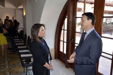 Board member Araceli Lonergan of Community Hospital of Huntington Park chatted with fellow board member Adam Darvish of Kindred Healthcare before April 13's board meeting.